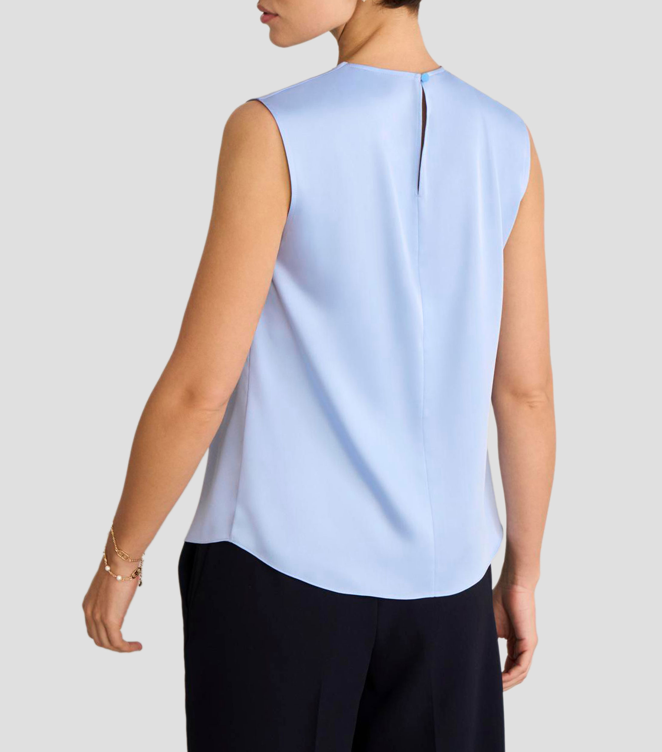 Blusa lisa sin mangas Mujer